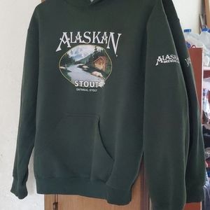 Alaskan stout dark green sweater